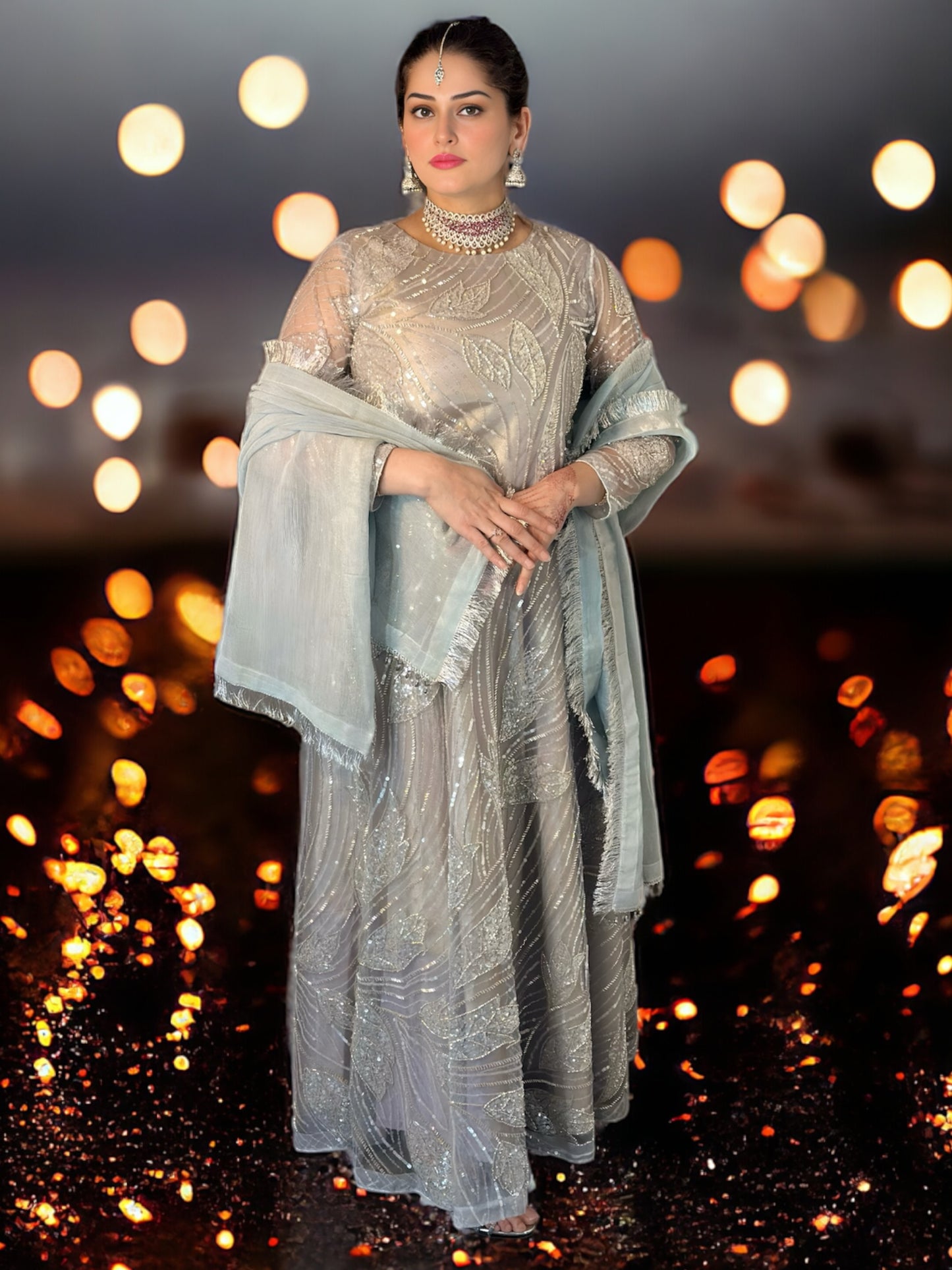 Exquisite Elegance: Embroidered Net Three-Piece Suit with Intricate Details